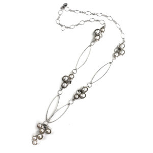 Long floating necklace in pearl and silver by pam fox